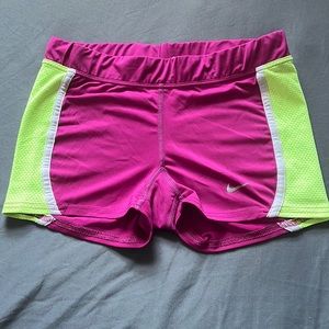 Nike xs spandex. Pink and neon yellow. Mesh sides with white stripes. Dri fit